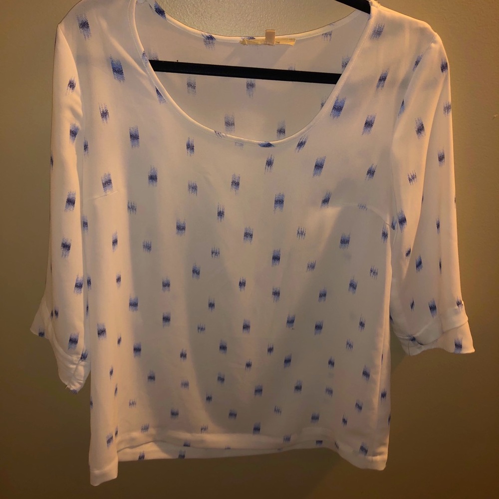 White blouse with blue details